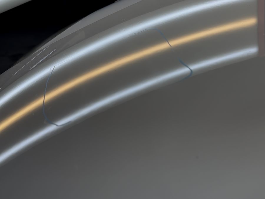 Same hood after paintless dent repair